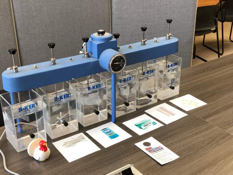Beakers at the City's Water Reclamation facility contain various materials and how they break down when flushed.  Many items do not break down and can cause sewer backups.  Residents are being advised to not pour hot oils, fats and grease down their kitchen drains and to only flush toilet paper, to avoid costly backups and clogs.