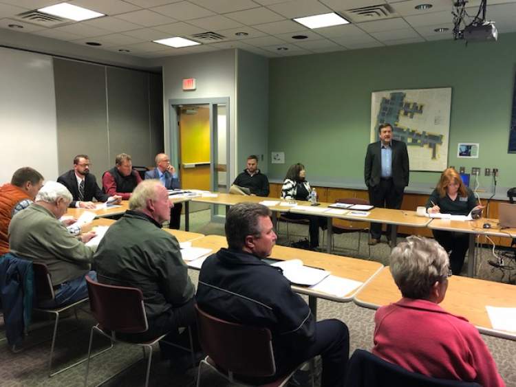 Community Development Director Ken Young shares a presentation on proposed changes to the City's Tax Increment Financing (TIF) policies at an open house April 24.