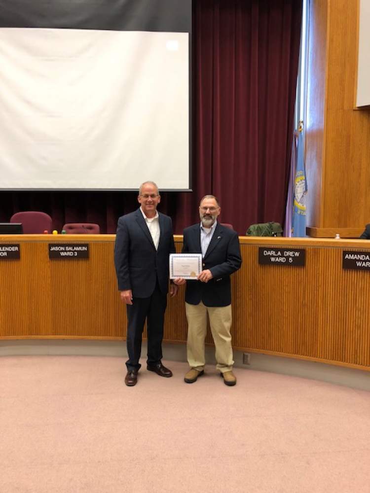 Mayor Steve Allender (left) and Pascal Bedard, Rapid City's Veteran of the Month for April.