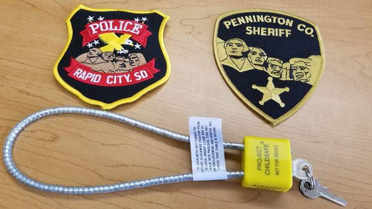 RCPD and PCSO collaborate with Project ChildSafe to offer free gunlocks to the public