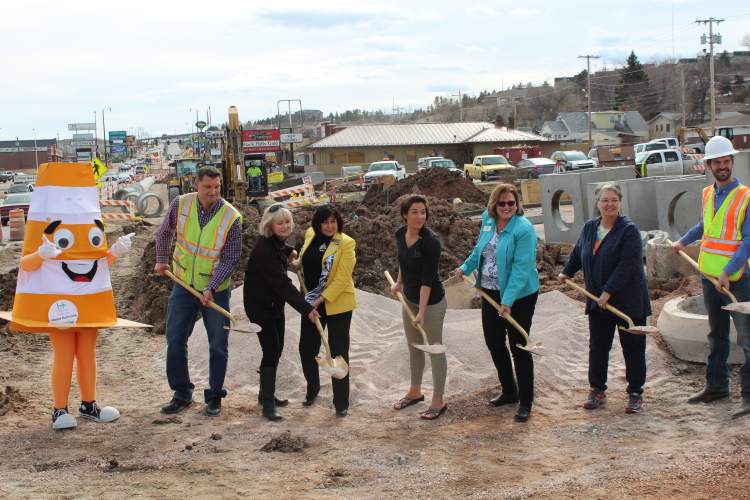 City officials, business owners, Chamber officials and residents gathered for the groundbreaking ceremony for the third and final phase of Mount Rushmore Road's reconstruction.