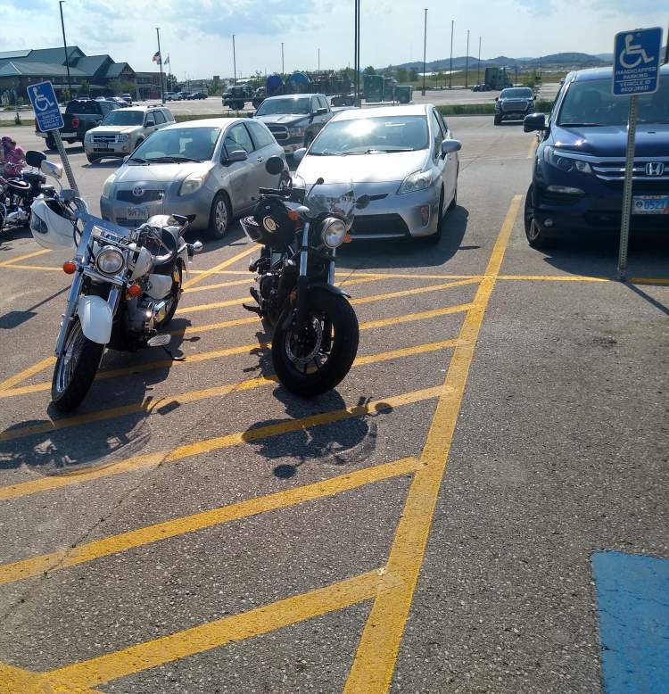 Don't Park There! City Committee Reminds Public Not to Park in Striped Spaces