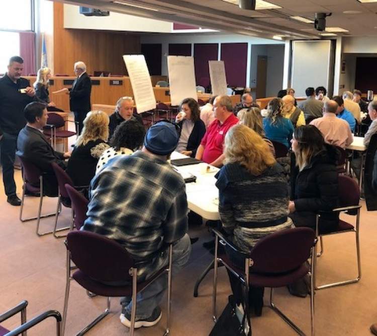City staff led table discussions on a variety of topics at the fifth quarterly 'Coffee With Planners' event at Council Chambers.