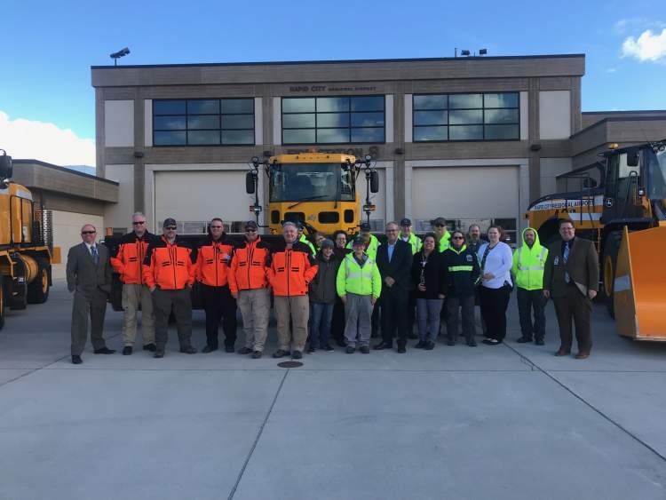 Mayor Allender and the Rapid City Regional Airport staff, celebrating a record-setting 2017.