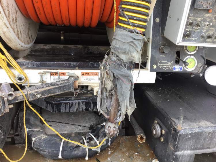 This photo is of a City jet hose used to clean the lines and when crews reel it back, the 'flushable' wipes hang up on the hose just like they do in the sewer lines.