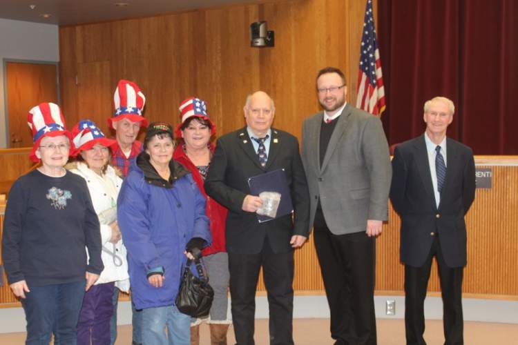 George B. Wallace is Rapid City's Veteran of the Month for February.  He poses with members of the local widowed persons support group that nominated him for the recognition.