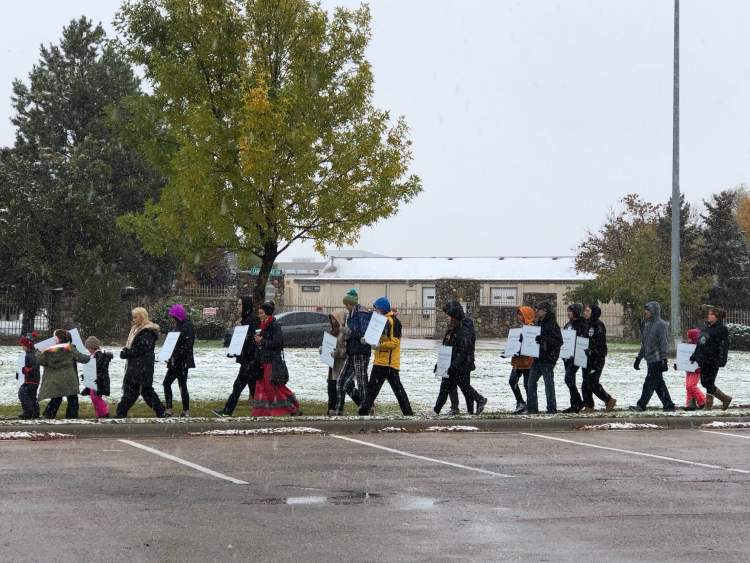 Walkers participate in the 2018 Remembering The Children Memorial Walk. This year's Memorial Walk is scheduled for 10 a.m. Monday beginning at Sioux Park and will be followed by a groundbreaking ceremony for a memorial in the open field behind Canyon Lake Methodist Church and West Middle School.