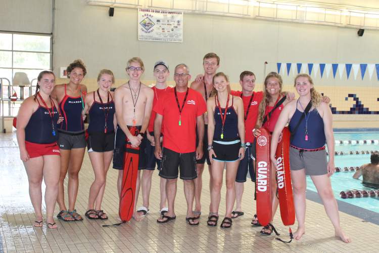 Mayor Steve Allender with Rapid City Swim Center lifeguards in this City file photo.  The City is seeking lifeguards for this summer to serve at the City's pools.