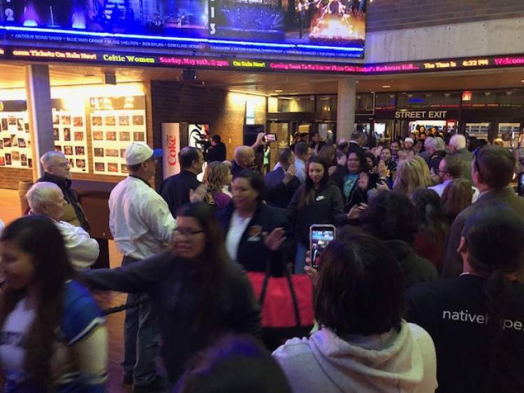 Community, business and city officials form a greeting line and provide a red carpet welcome to arriving teams for this week's LNI tournament.
