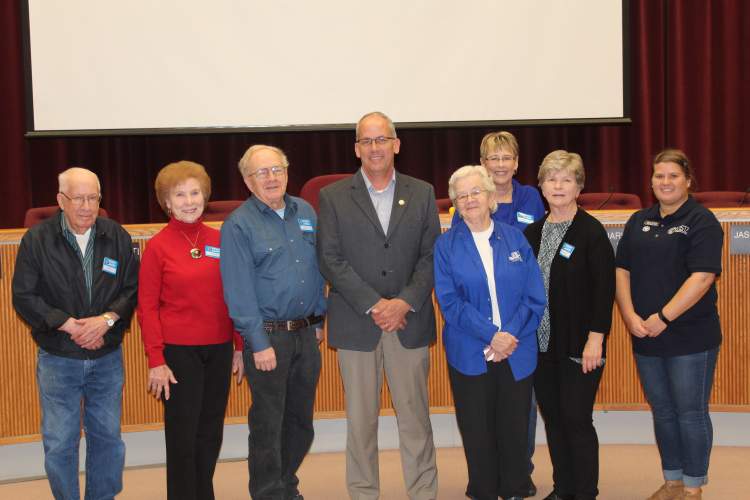 Volunteers of various groups pose with Mayor Steve Allender at Tuesday's proclamation signing ceremony.  From left, Art Thompson, Penny Dawson, Tim French, Mayor Allender, Pat Rohrback, Jan McArthur, Lorann Berg, and Mary Adams.  Art, Penny, Tim, Jan and Lorann are with the Black Hills RSVP+ Program; Pat is with the Senior Companions Program and Mary is with the AmeriCorps VISTA Program.