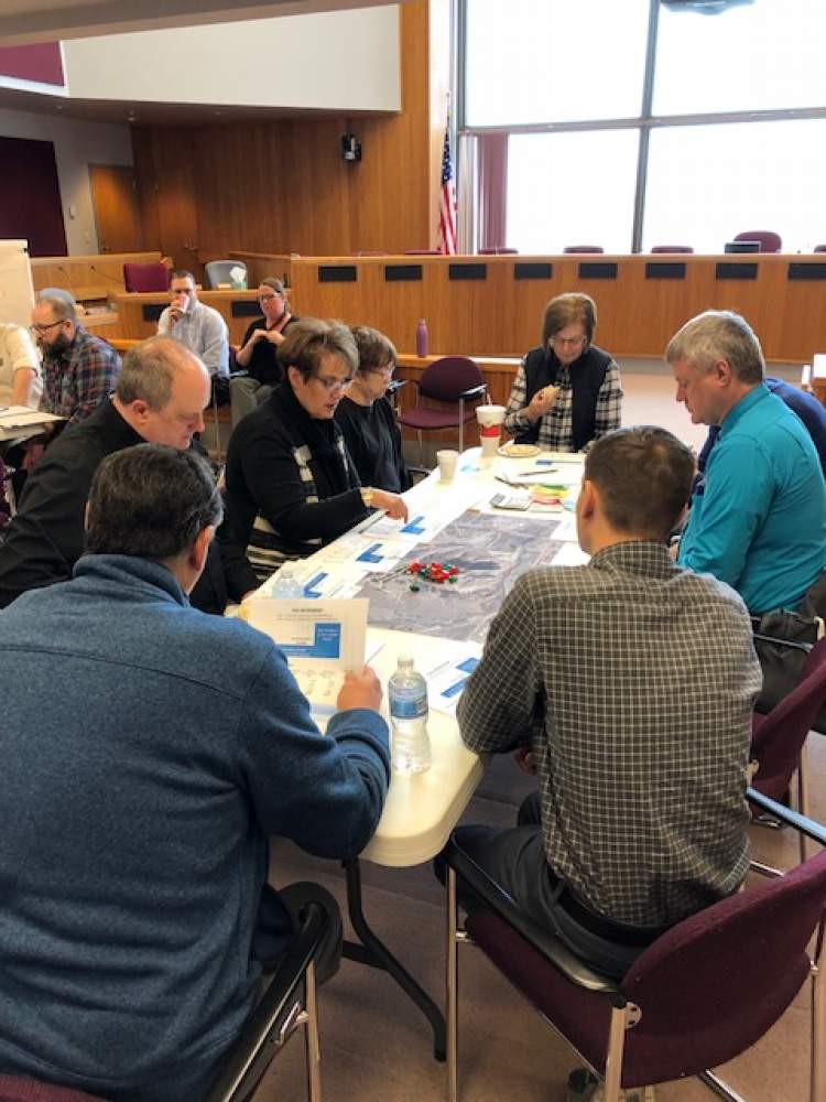 City staff visit with the public during a quarterly 'Coffee With Planners' session in February.  The next public session is scheduled for Wednesday.