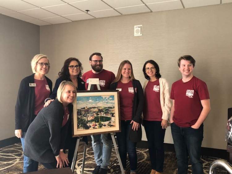 Julie Schmitz Jensen, third from left, poses with Visit Rapid City staff on the occasion of her retirement October 27, 2021.  Jensen passed away earlier this week. She had served more than 20 years promoting travel and tourism and Rapid City and the Black Hills as travel and tourism destinations.
