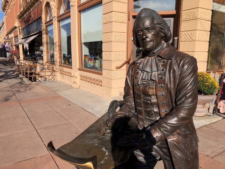 The statue of President Thomas Jefferson at the northeast corner of St. Joseph Street and Seventh Street