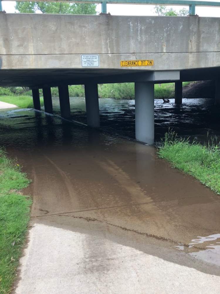 The bike path at the Mount Rushmore Road bridge has been inundated with water as has the bike path area on Canyon Lake Drive.  Bike path users are advised to use the street level crossings in these areas and the public is advised to use an abundance of caution around Rapid Creek due to increased depth and velocity of the water.