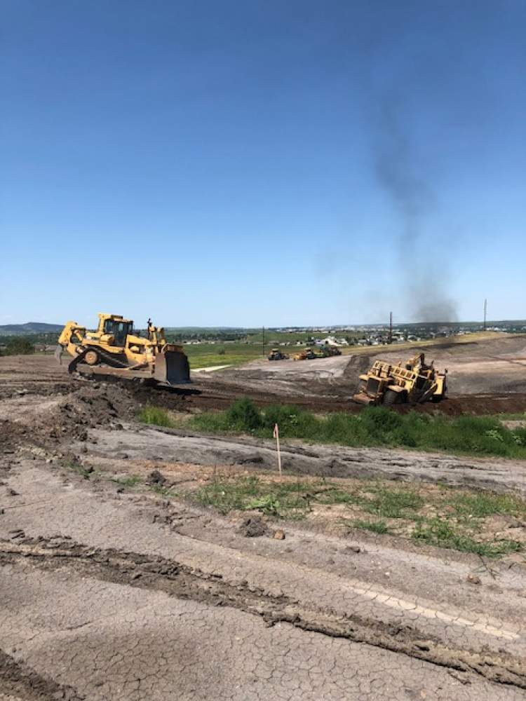 Contractors clearing an area for a new landfill cell at the Rapid City Landfill. 