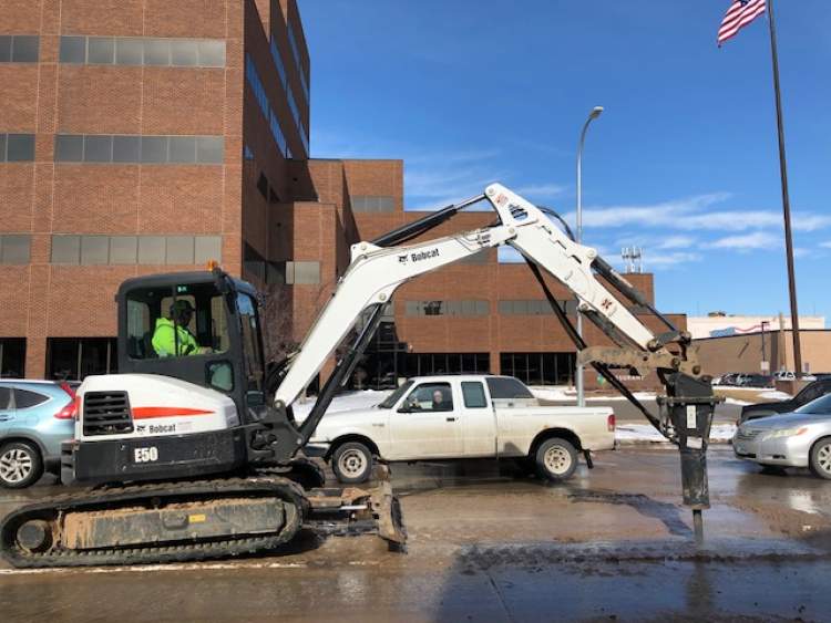 Water service has been restored but traffic restrictions will remain through the weekend and into at least Monday on Main Street from Seventh Street to Mount Rushmore Road and on two northbound lanes of Mount Rushmore Road in the affected area.
