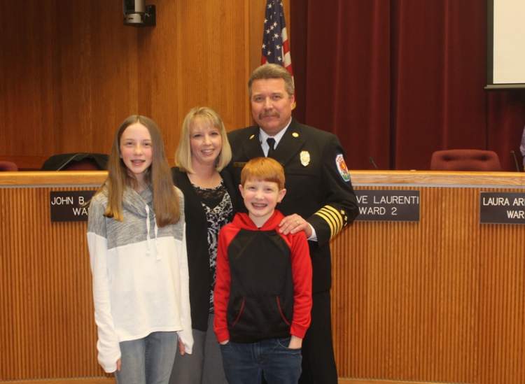 Fire Chief Rod Seals and his family at the 2018 swearing-in ceremony in Council Chambers.  Seals served as department chief for more than four years and served in the Rapid City Fire Department in many capacities from 1995 to his retirement in 2020.